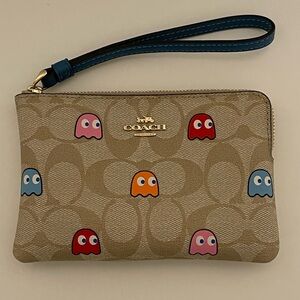 Coach Corner Zip Wristlet in Signature Canvas With Pac-Man Ghosts Print F73387
